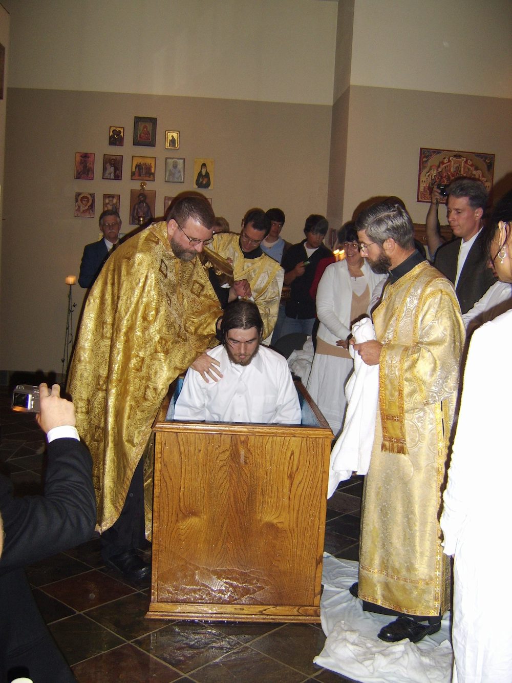 John Valadez being baptized.