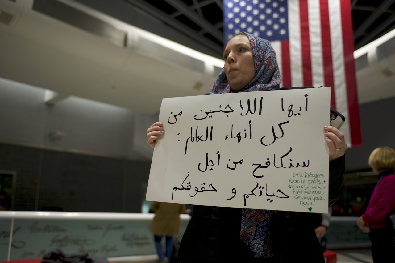 Sofia Fenner protests the Muslim Ban of President Donald Trump at the International Arrivals of Philadelphia International Airport.