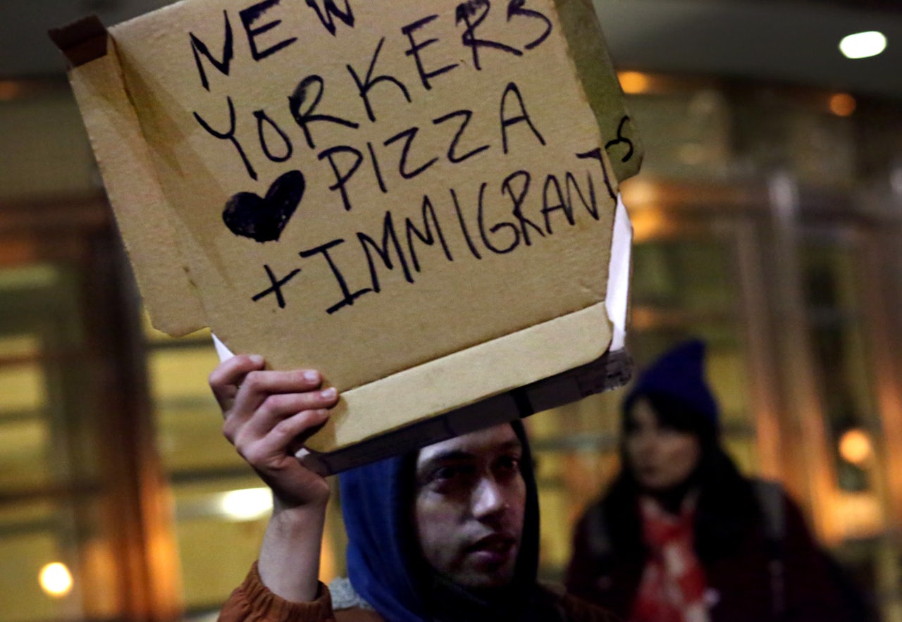 A crowd of protesters gathers outside of the Brooklyn Federal Courthouse as a judge hears a challenge against President Donald Trump's executive ban on immigration.