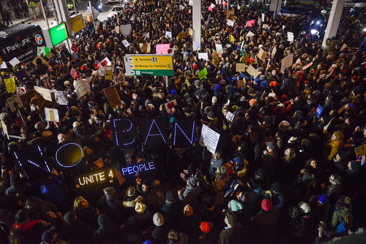 Protesters rally during a demonstration against the Muslim immigration ban at John F. Kennedy International Airport.