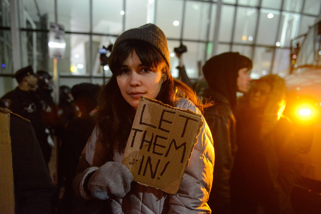 A protester at JFK.