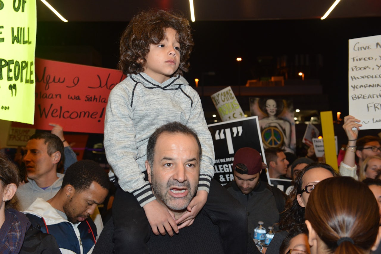 Demonstrators rally against a ban on Muslim immigration at Los Angeles International Airport.