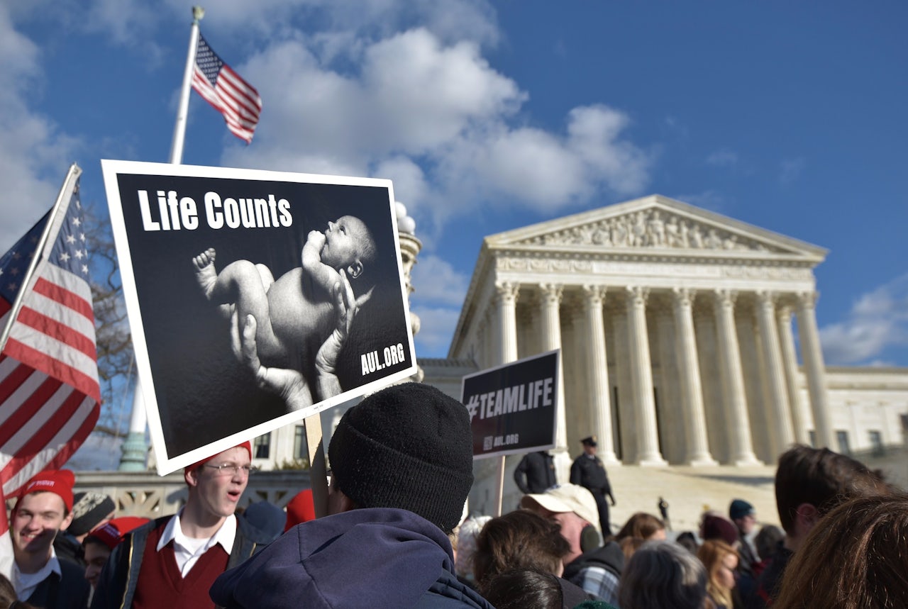 Anti-abortion activists take part in the annual March for Life in front of the U.S. Supreme Court on January 22, 2015, in Washington, D.C.
