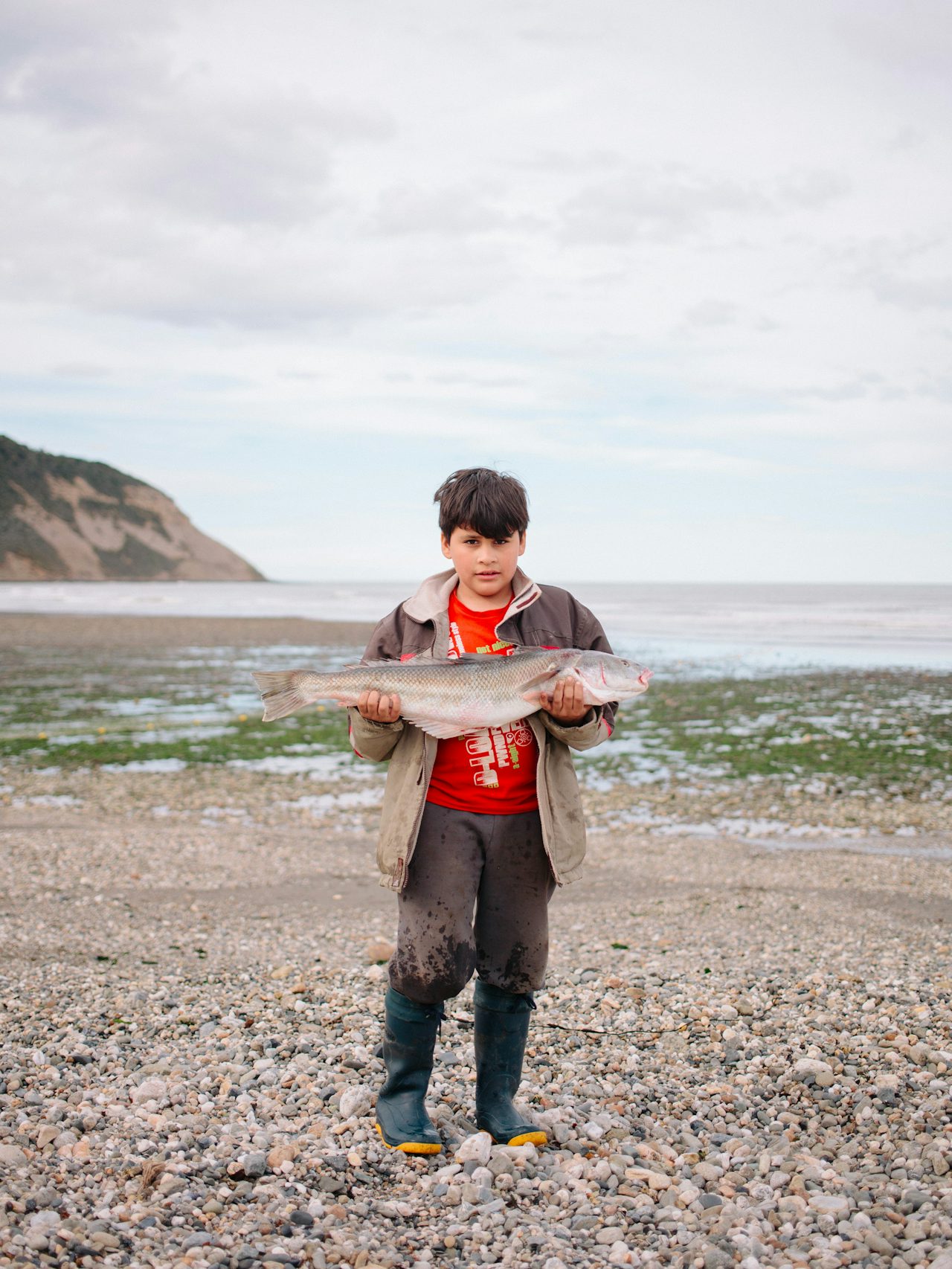 Eliseo, 8, comes from several generations of fishermen.