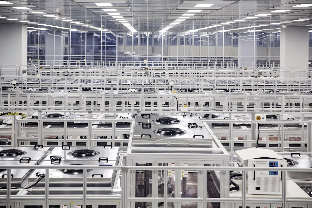 A fully automated assembly line at a BOE Technology Group Co. factory in Chongqing, China.