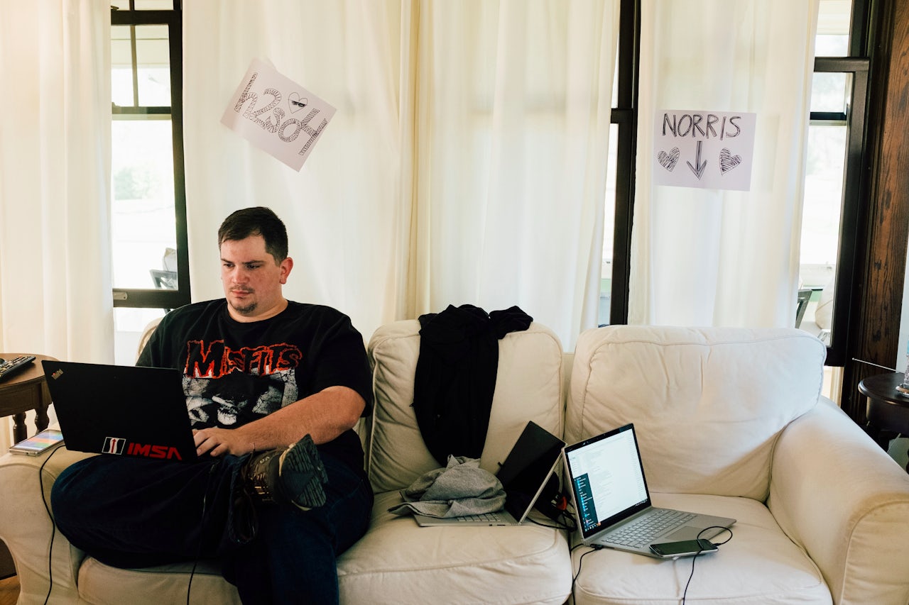 A member of Trivial Fursuit hangs out at the team's headquarters.