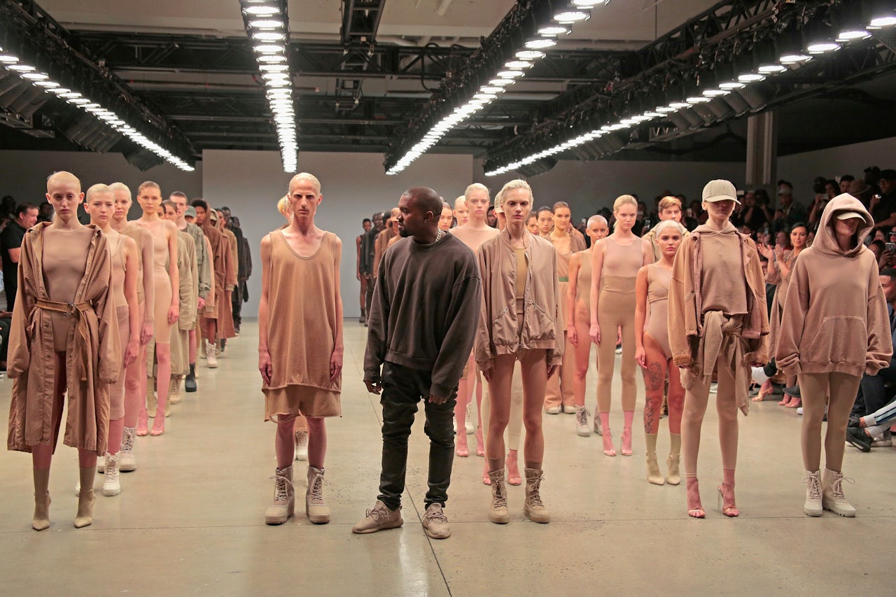 Kanye West and models during Yeezy Season 2 in 2015. West's fashion collections have been criticized in the past for lacking originality.