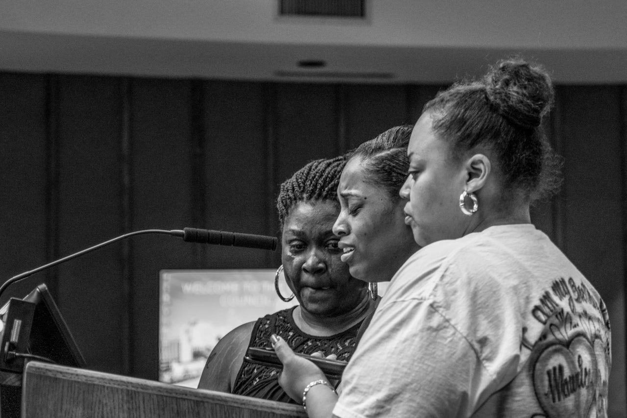 Rolanda Byrd, the mother of Akiel Denkins, Ashley McCleod, and Aisha Flood speak at the Raleigh council meeting.