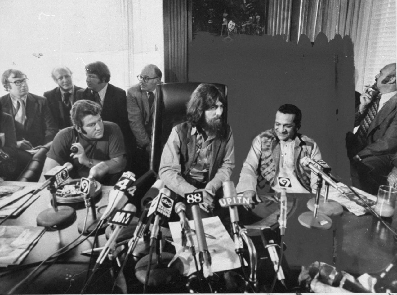 Allen Klein, George Harrison, and Ravi Shankar at a press conference for the Concert for Bangladesh in 1971.