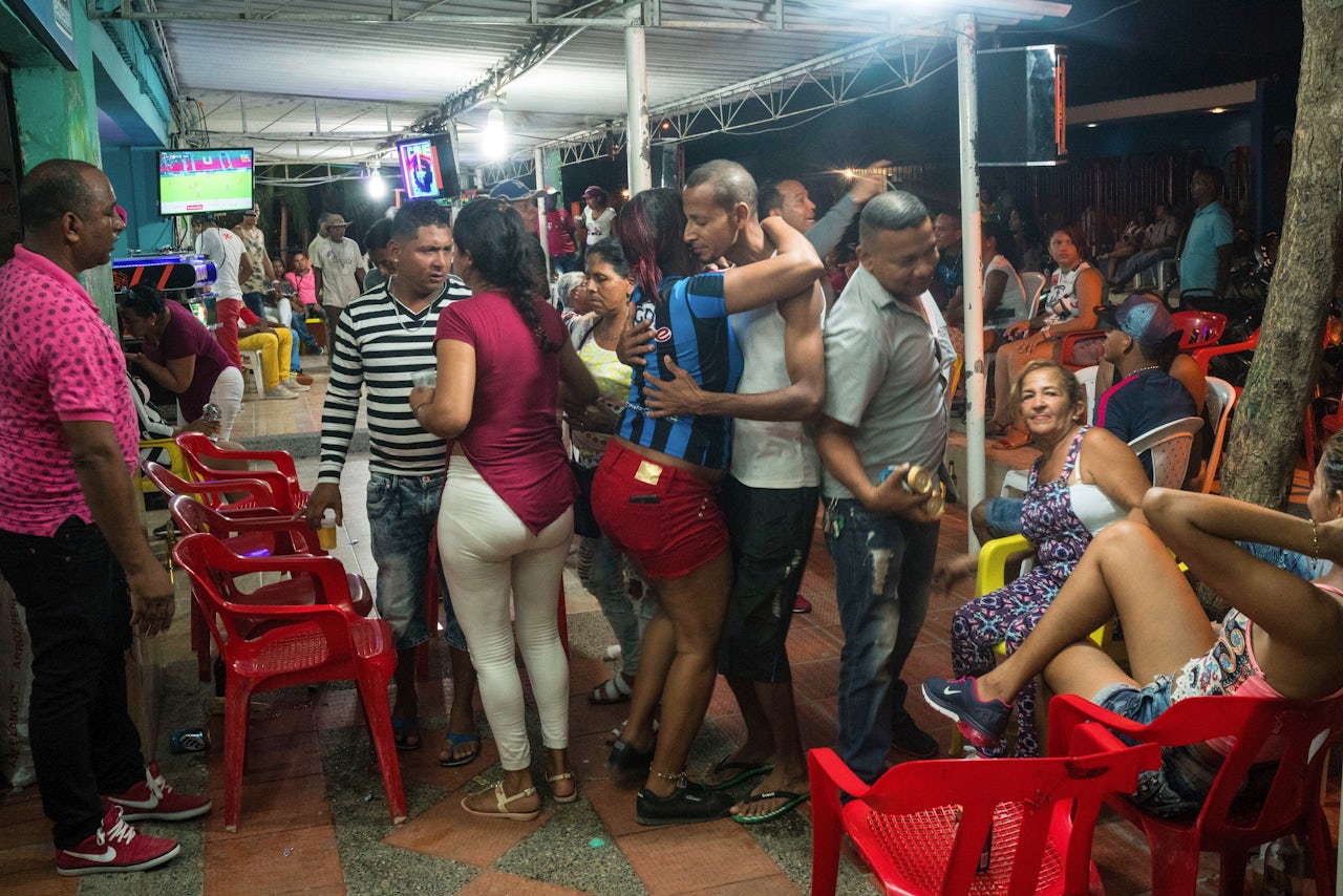 People dance at the El Gran Che picó in Barranquilla, Colombia.