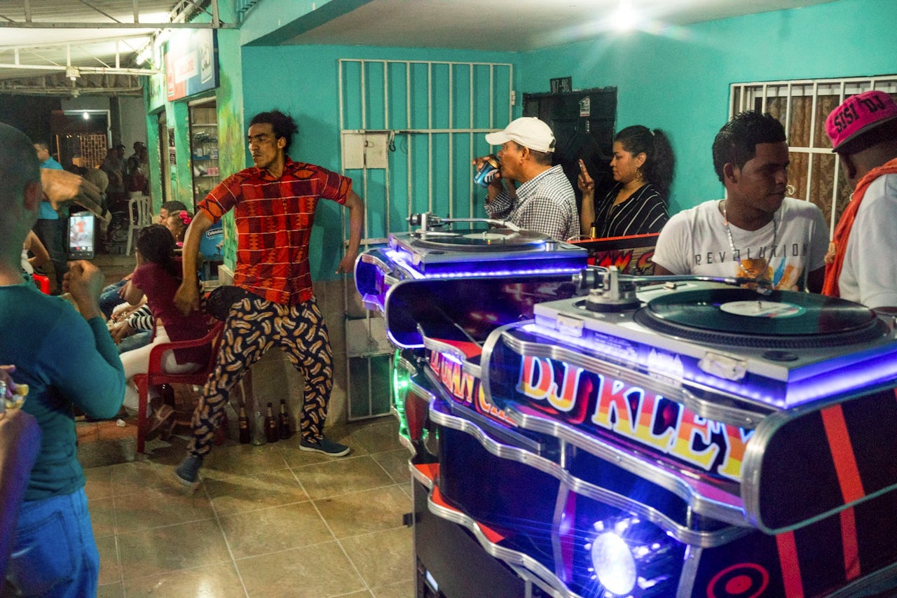 People gather at the El Gran Che picó in Barranquilla, Colombia.