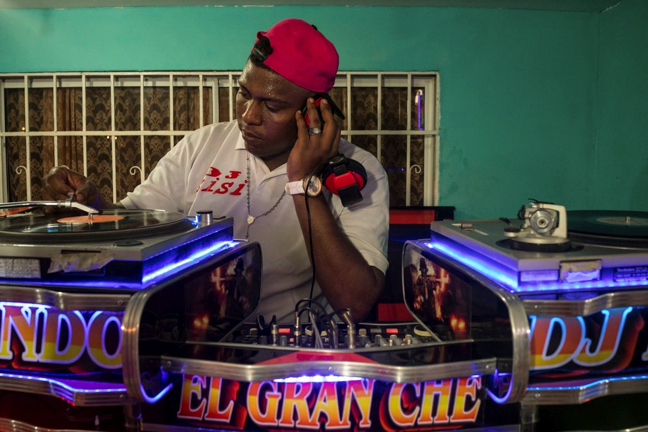 DJ Sisi spins records at the El Gran Che picó in Barranquilla, Colombia.