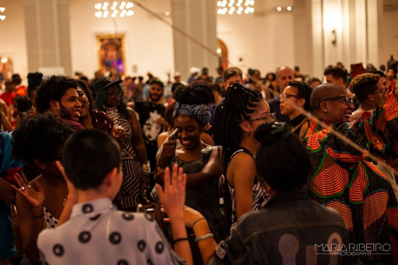 Attendees dance at the By Us Opening at the Brooklyn Museum's Target First Saturday: We Wanted A Revolution exhibition in July 2017.
