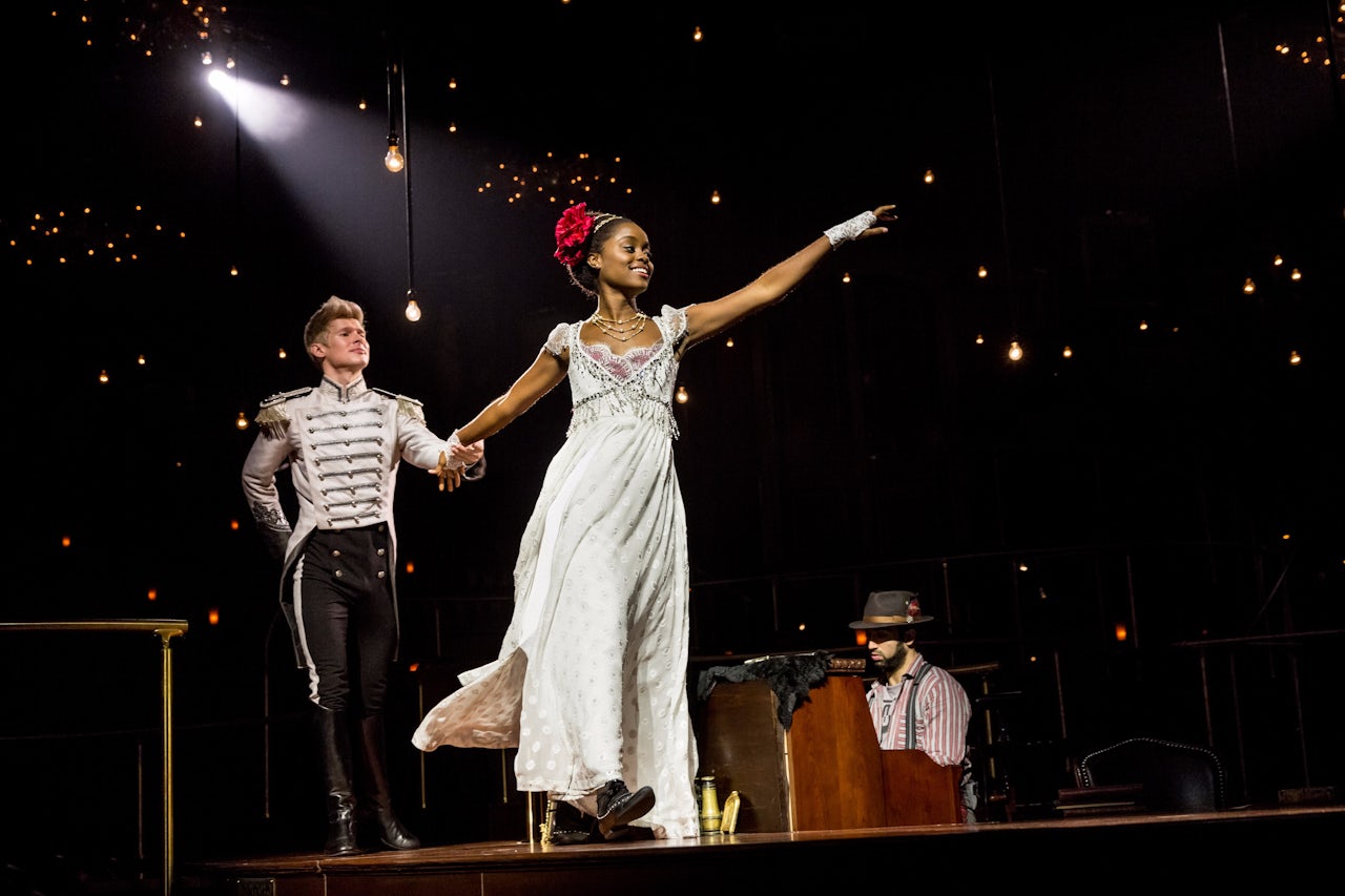 Lucas Steele as Anatole and Denée Benton as Natasha.