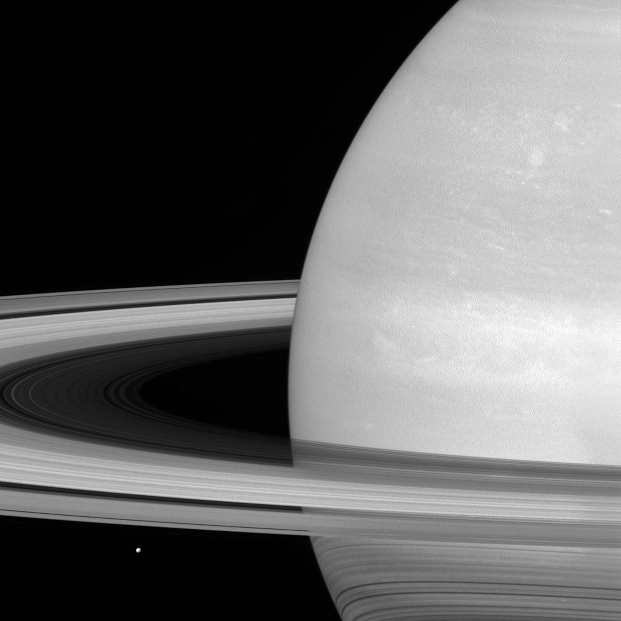 Saturn's rings, which are made of small, icy particles spread over a vast area, are generally no thicker than the height of a house.