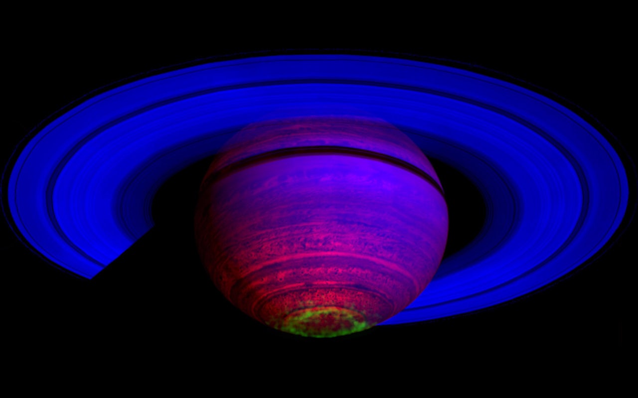 In this image constructed from data collected in the near-infrared wavelengths of light, Saturn's auroral emission is shown in green.