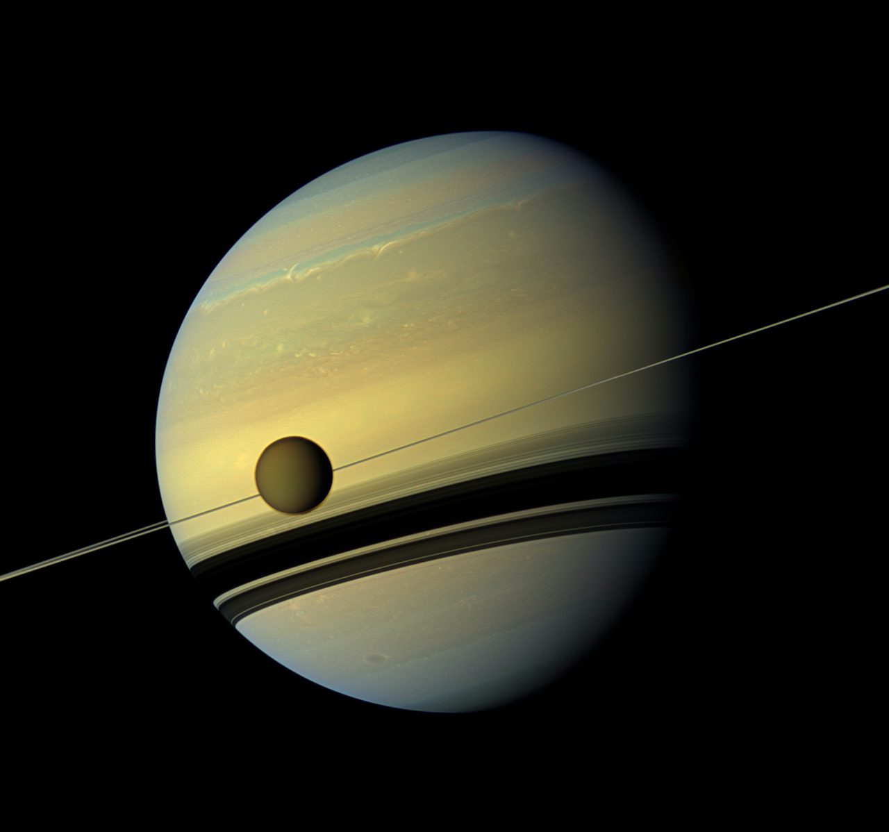 Saturn and one of its moons.