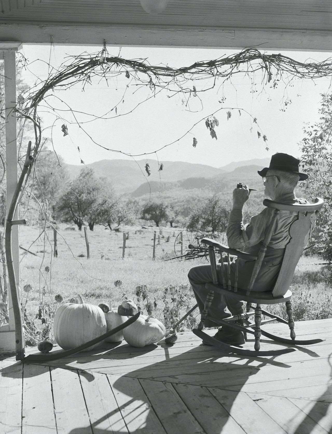 A farmer enjoys autumn on his land in the 1950s.
