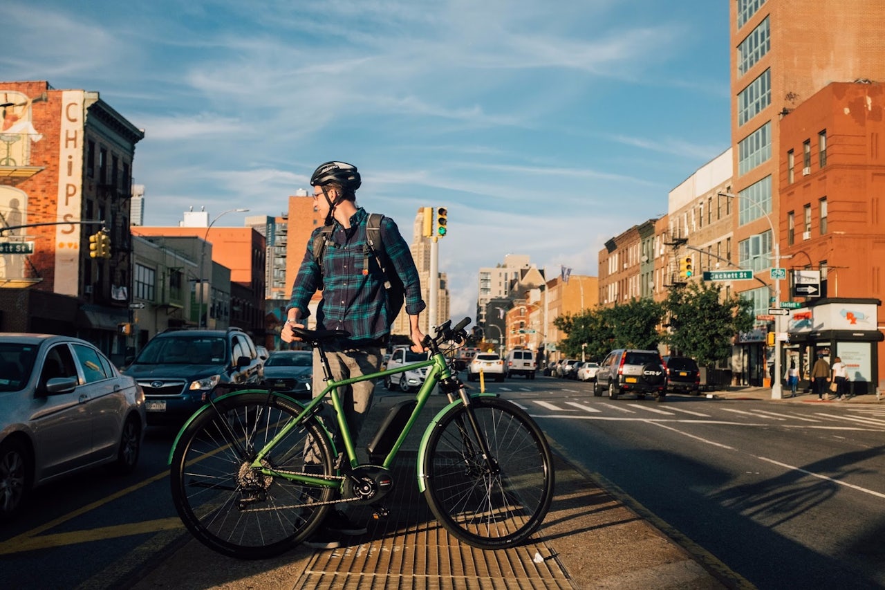 Aaron Gordon with an e-bike in Brooklyn.