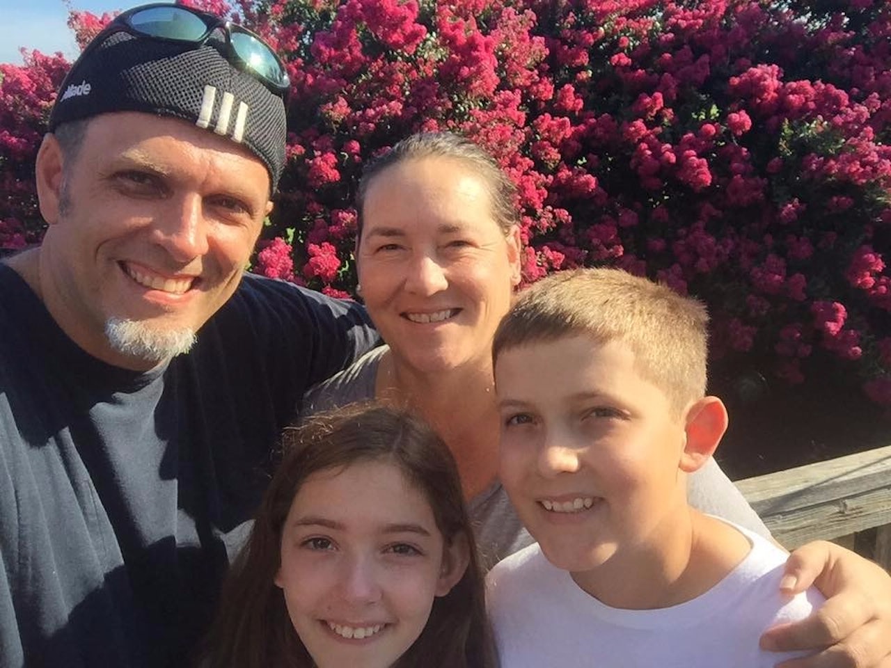 Jim's wife and children, pictured here with Jim (left), encouraged him to learn more information about his birth family and have supported him through the long emotional process.