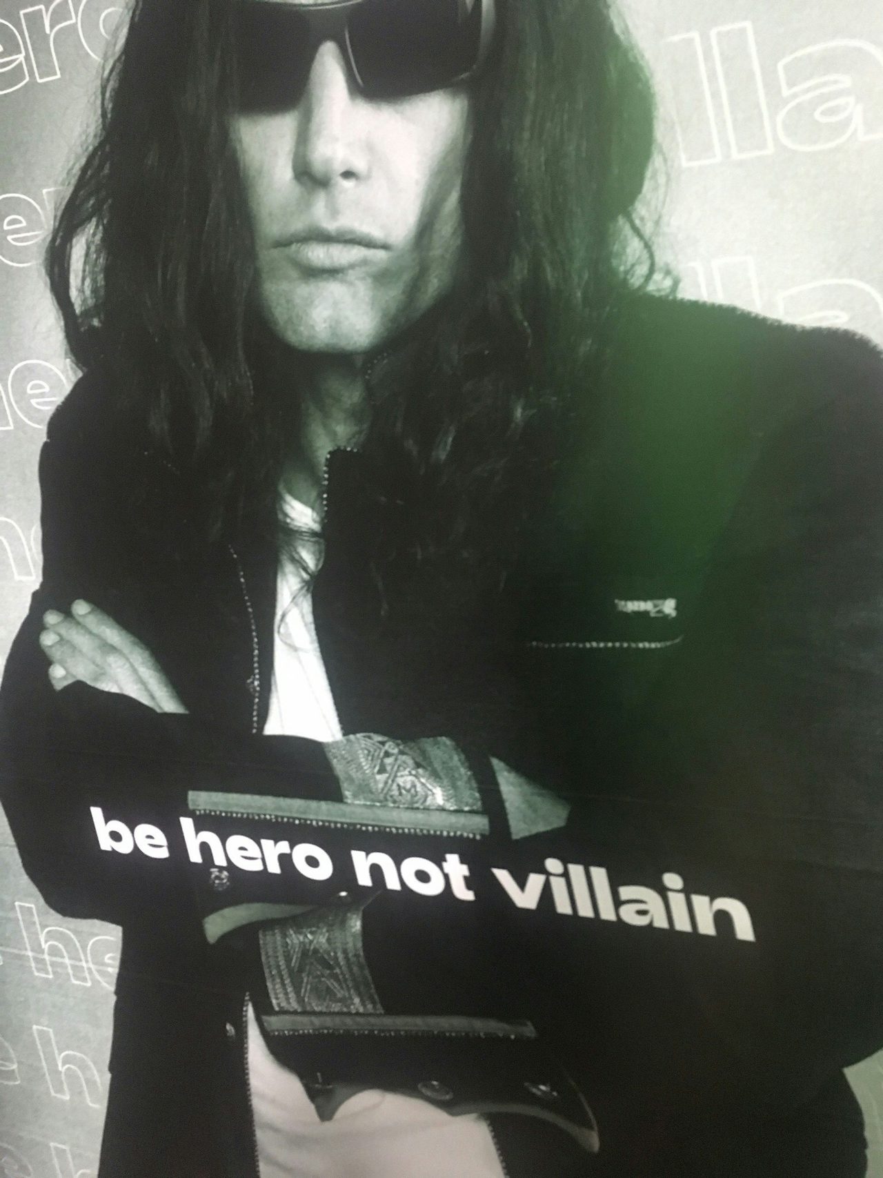 A poster of James Franco hanging in Tommy's Planet.