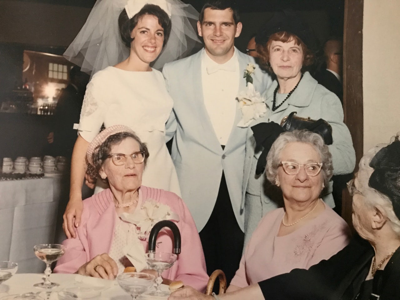 Inez Burns (standing, on the right) at a family wedding in 1965.