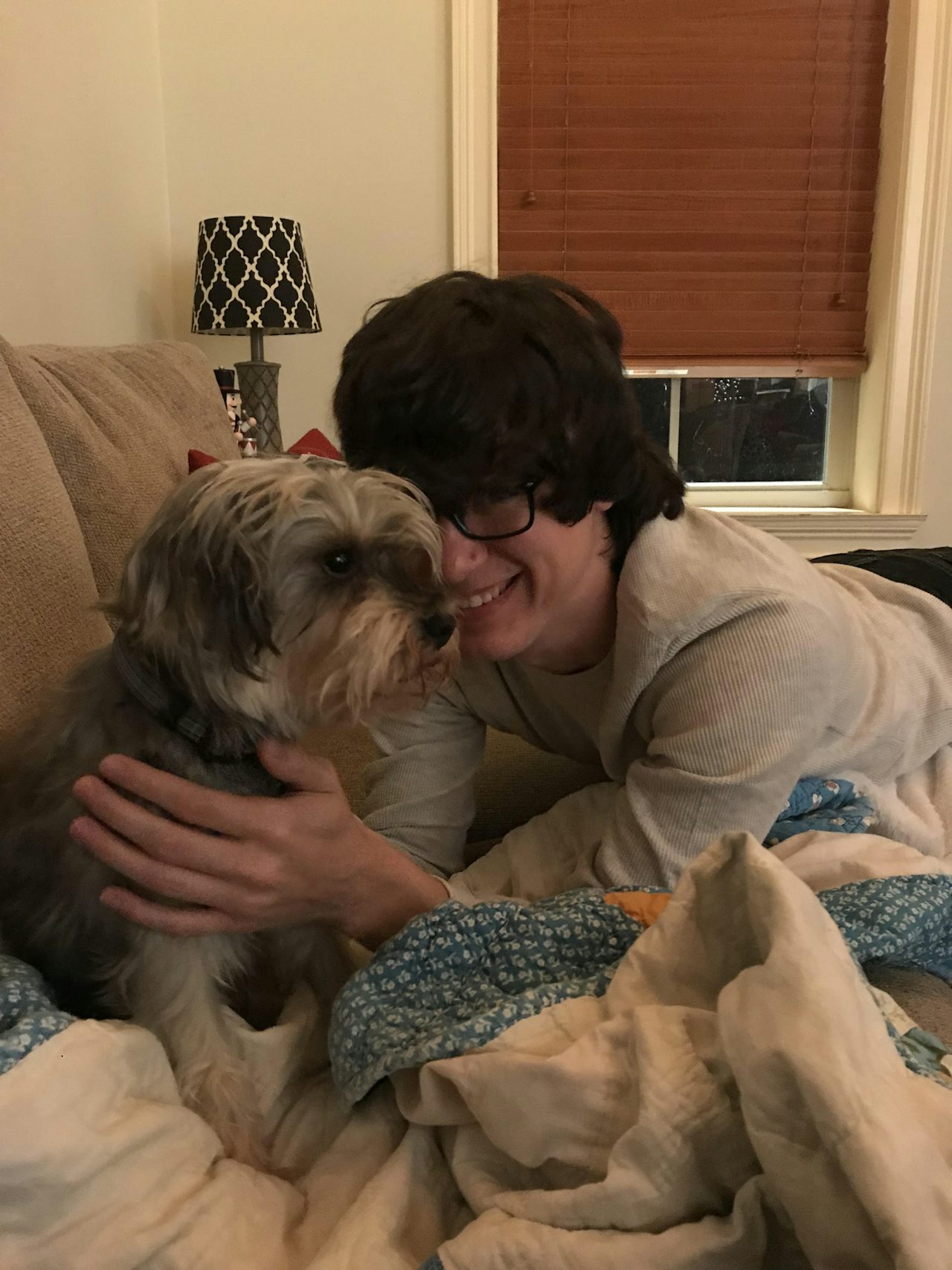 Josh and his family's dog, Andy, after his release from prison and before his stay in rehab.