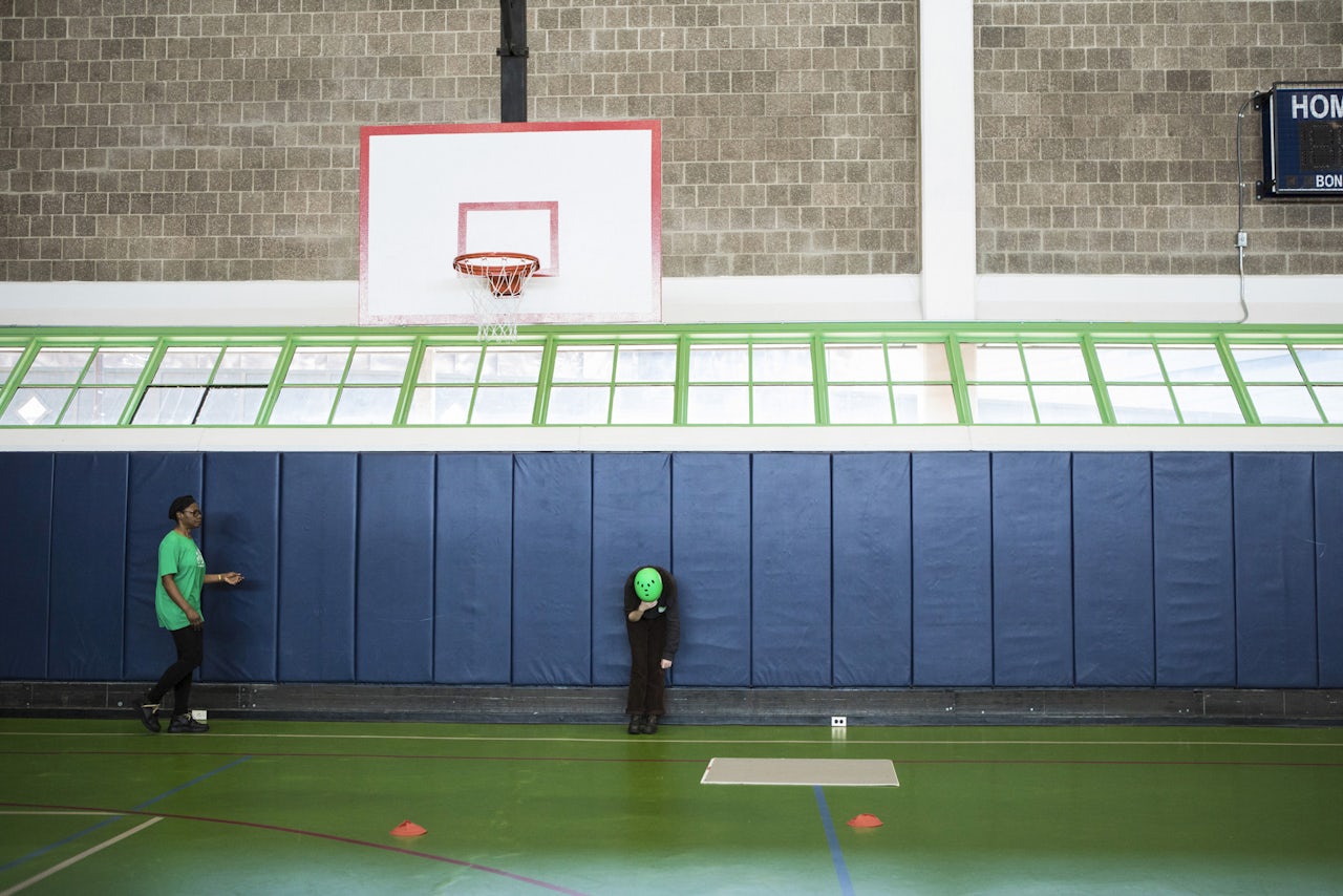 Yawa, an adult bicycle-riding instructor, comes to the author’s aid.