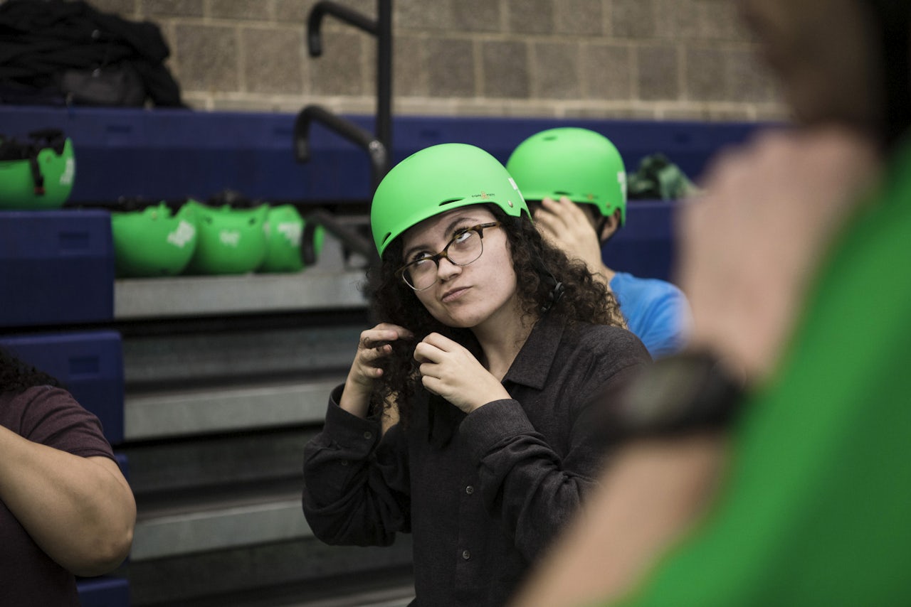 Putting on a helmet can be confusing for a first-timer.