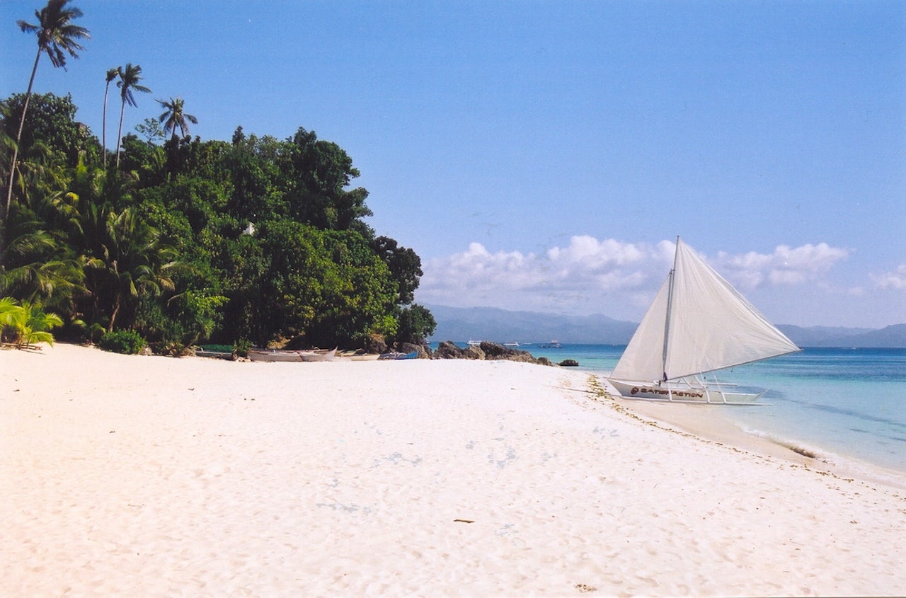 Boracay Island in the Philippines, which was recently closed due to the effects of climate change.