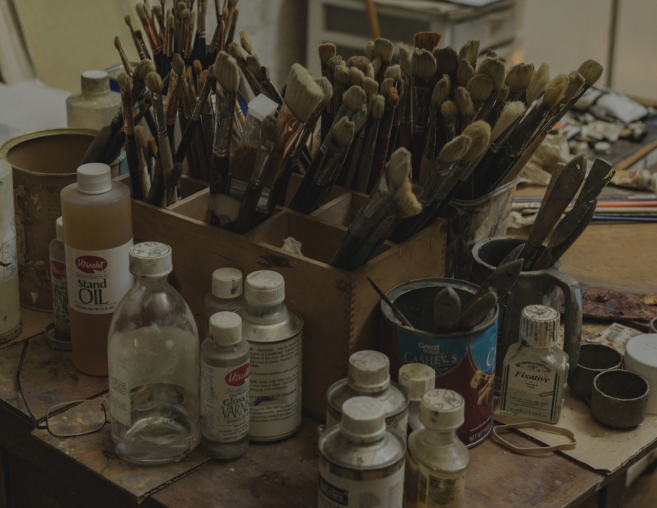 Paintbrushes in Burton Silverman’s studio.
