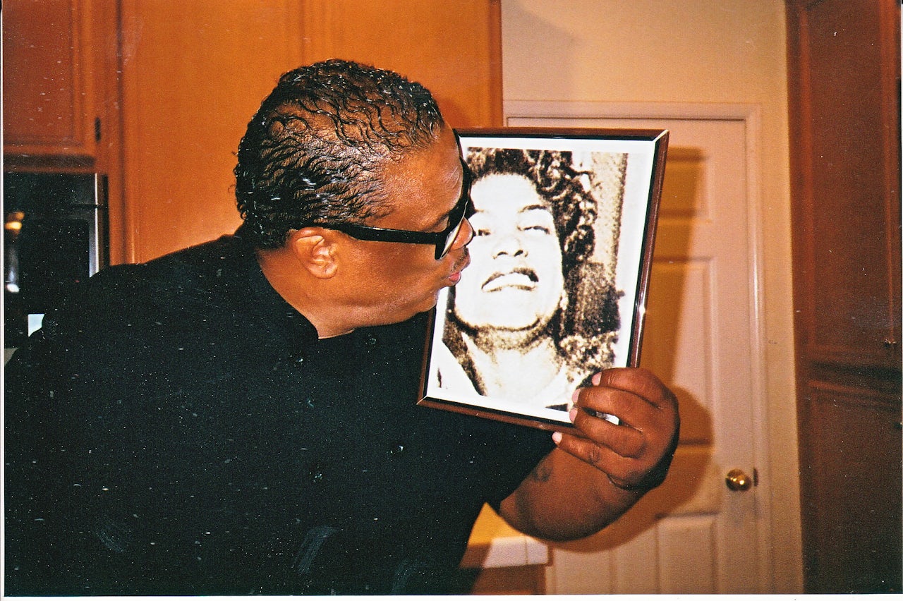 Chef Ron kisses a photo of his late mother, Pat.