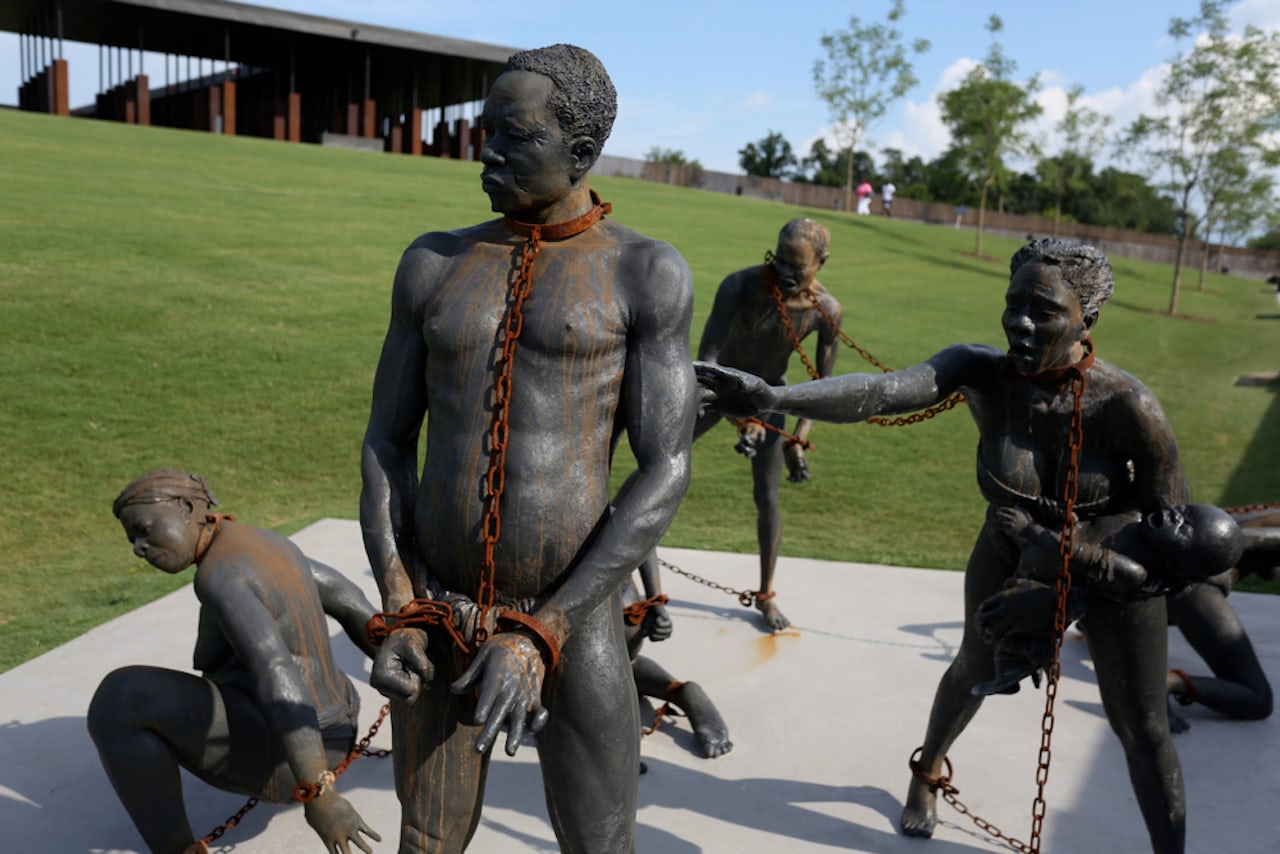 Statues of slaves outside the National Memorial for Peace and Justice.