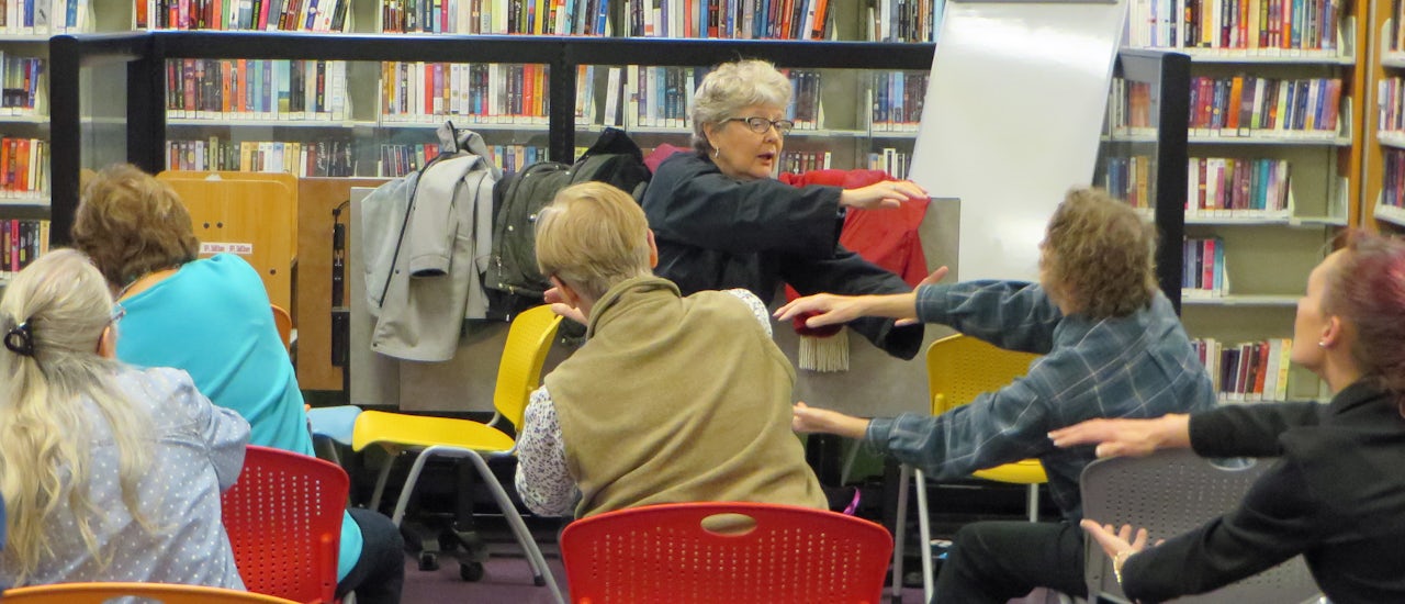 Seniors use newly open space in the Bellingham Public Library for a seated workout program.