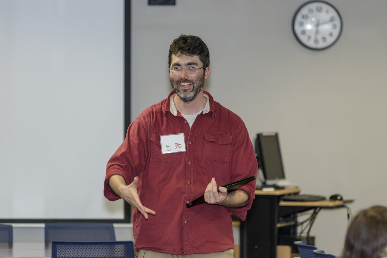 Ryan Edel delivers welcoming remarks on the conference’s opening night.