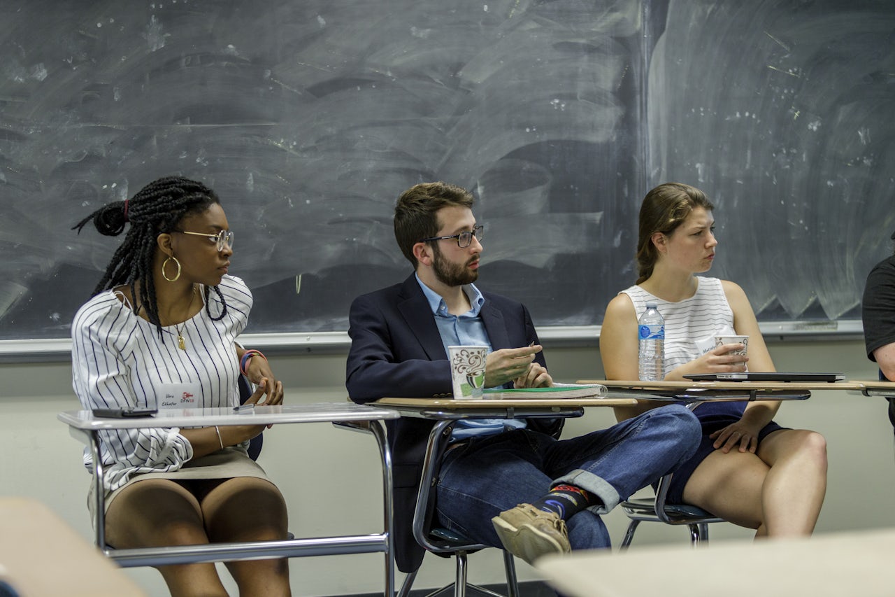Students Vera Ekhator (left), Daniel Shusset, and Mattelyn Wadley present on what they learned from their undergraduate “Philosophical Ideas in Literature: David Foster Wallace” course at Gettsyburg College.