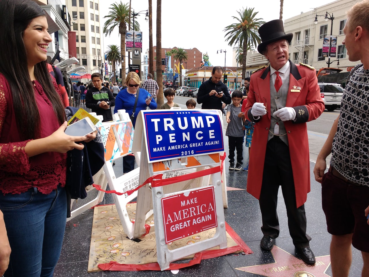 People gathered around the site of Trump's Walk of Fame star after it was vandalized in 2016.