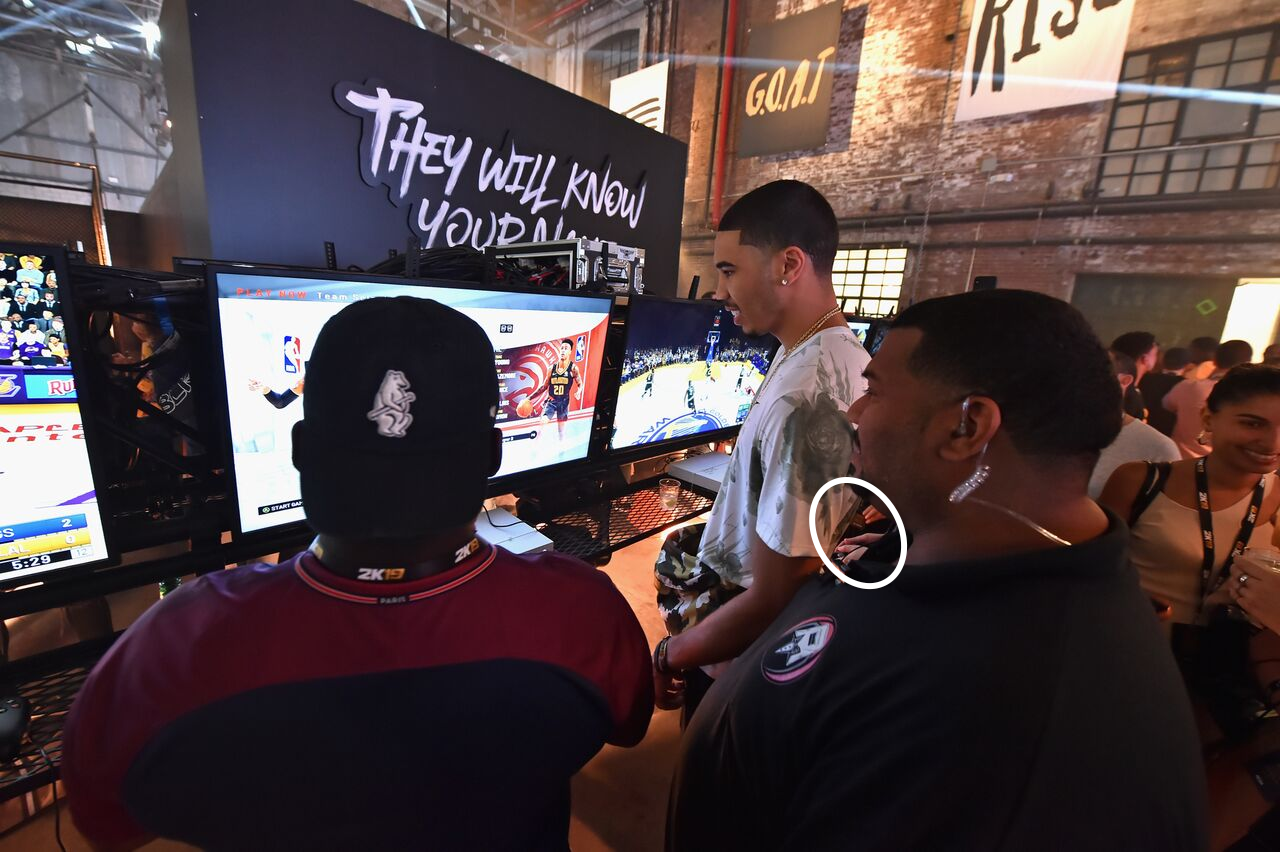 Jayson Tatum and the author (hands pictured).