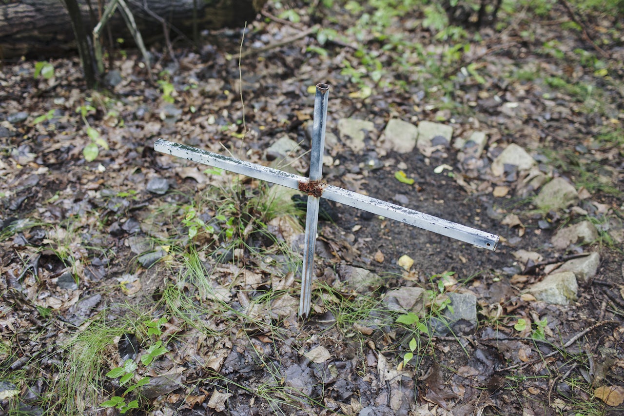 A cross marks the spot where Tom Crosslin was killed.