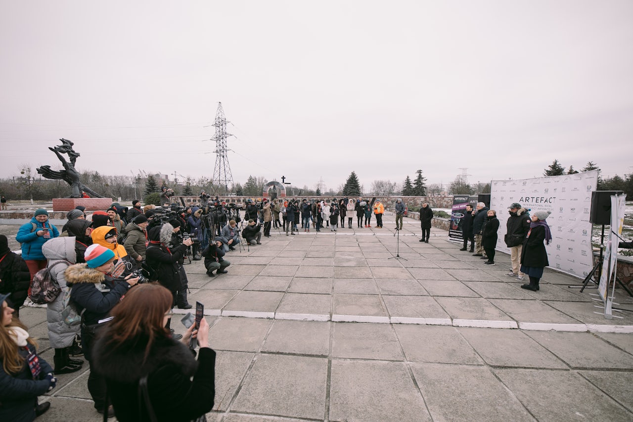 The media gathers for an introduction to ARTEFACT in the Chernobyl garden of remembrance.