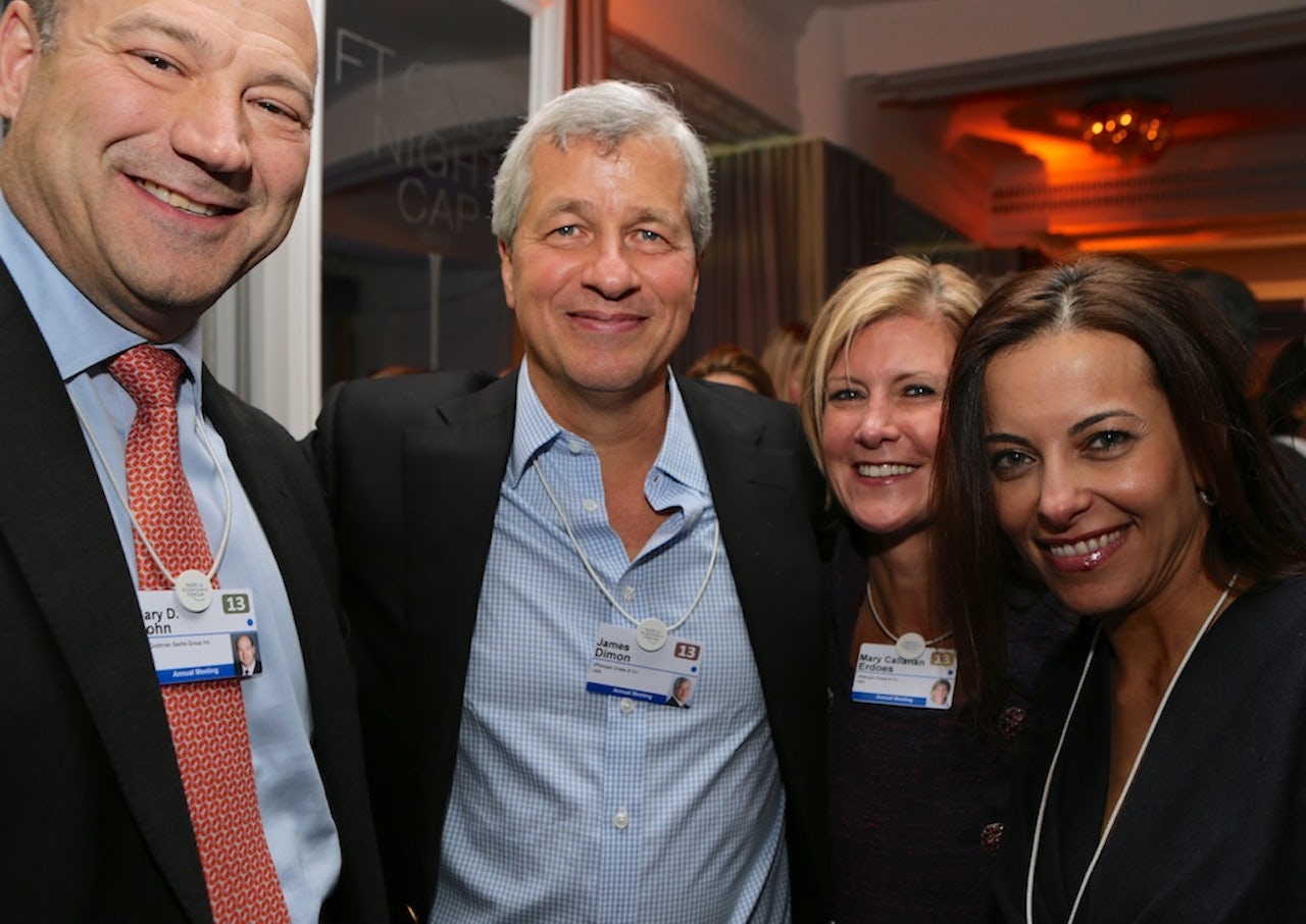 A 2013 photo of Dimon and Mary Callahan Erdoes of JPMorgan Chase with Gary Cohn and Dina Powell, then of Goldman Sachs, both of whom went on to work in the Trump administration.