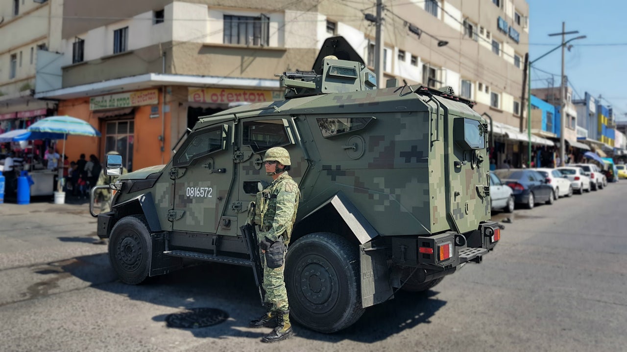 Heavily armed security forces are a common sight in Guadalajara.