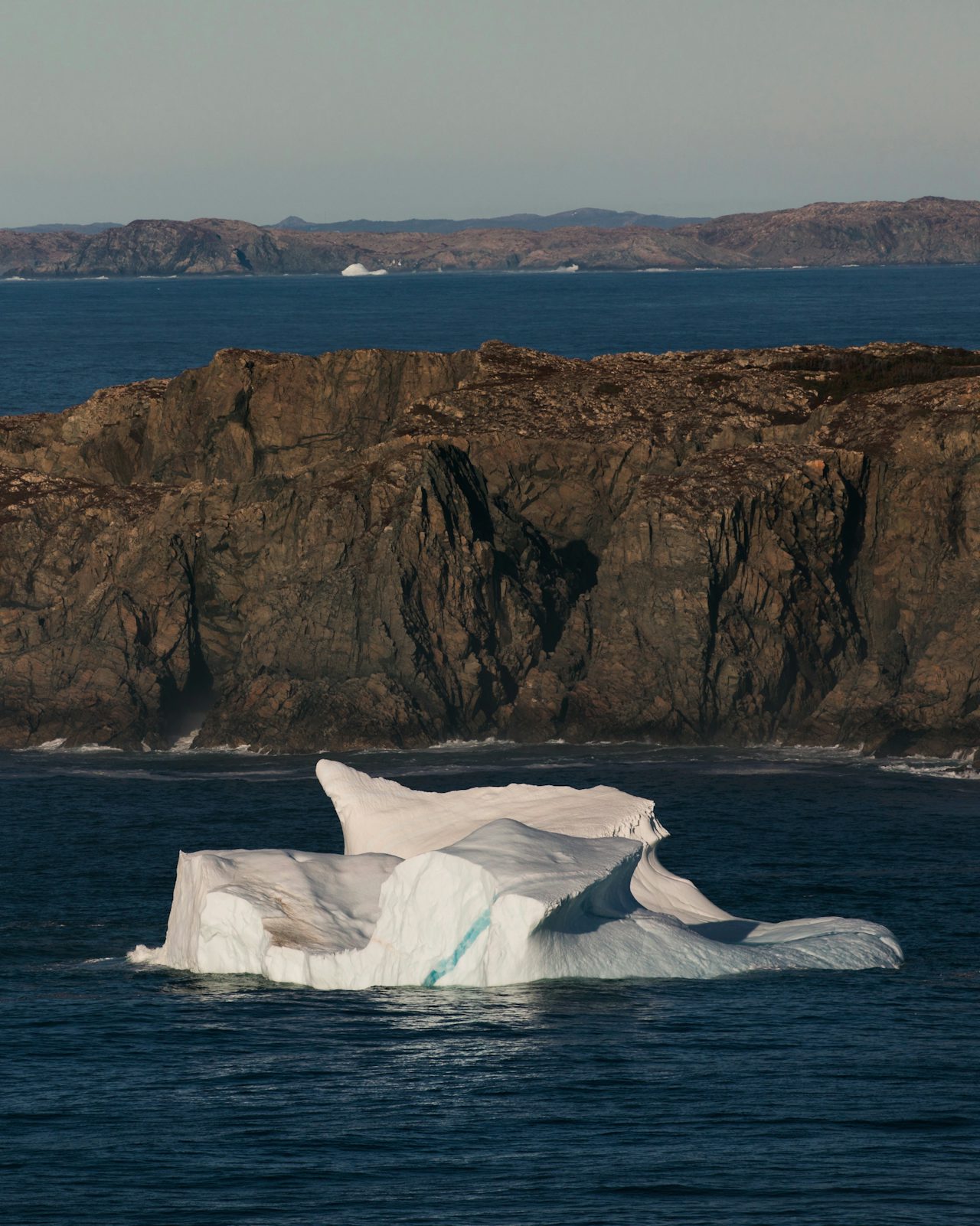Icebergs calve off of glaciers in Greenland and drift through the Labrador Sea, arriving at the coast of Newfoundland, in spring.