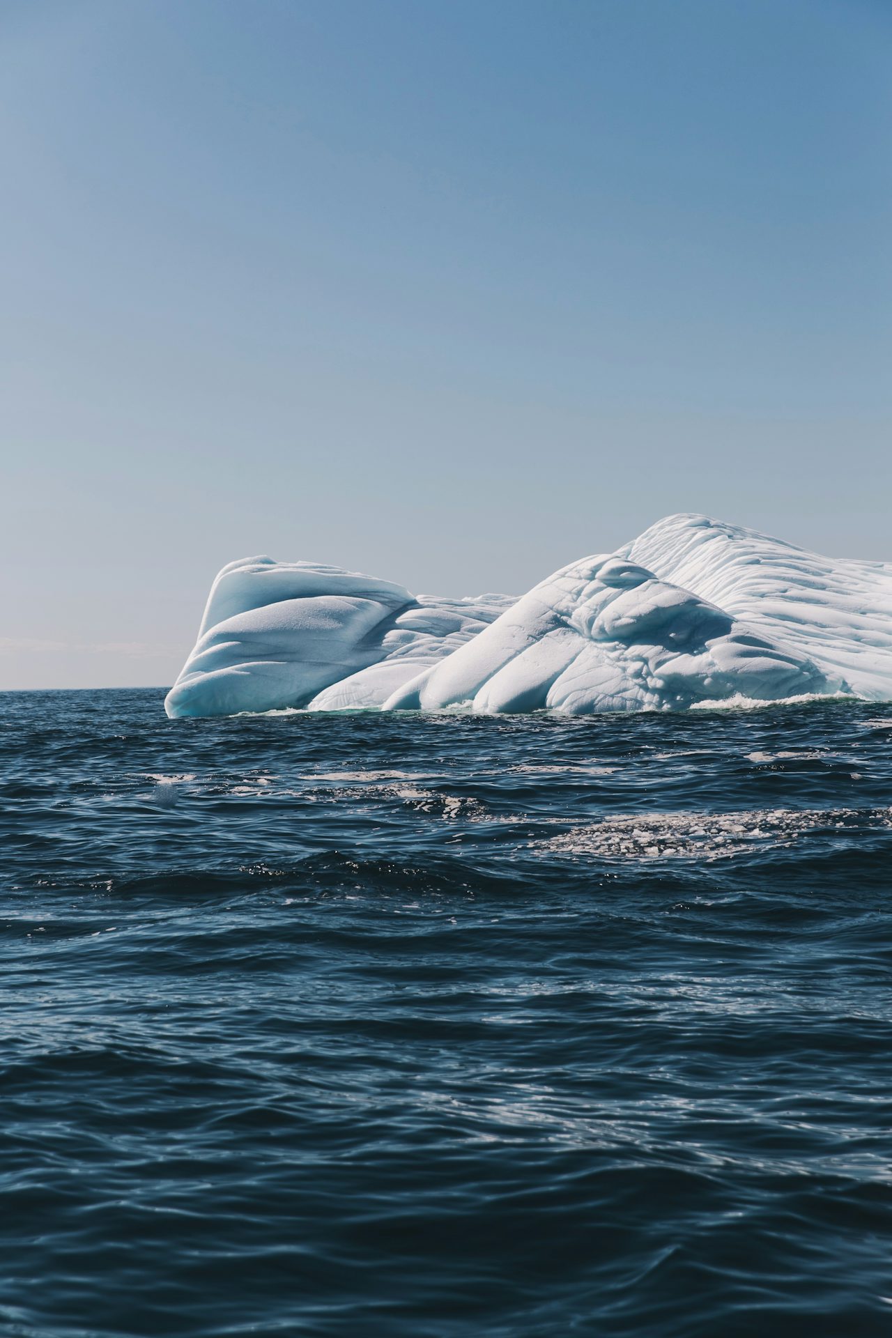 To observe an iceberg is also to watch it disappear, water streaming constantly over its surface. By summer, they’ve melted, entirely.