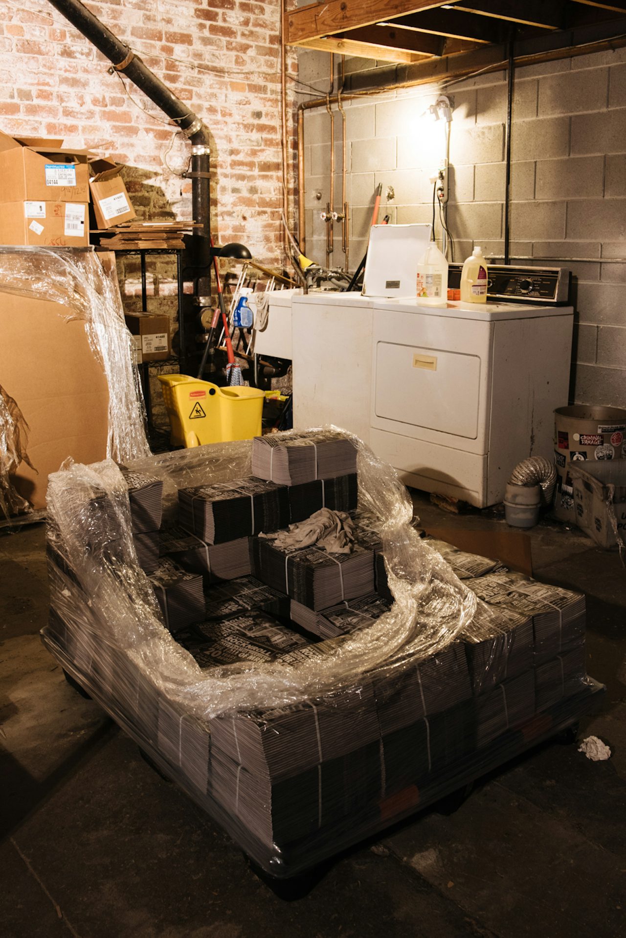 A pallet of one Maximum Rocknroll’s final issues sits in the multi-purpose garage, waiting to be shipped.