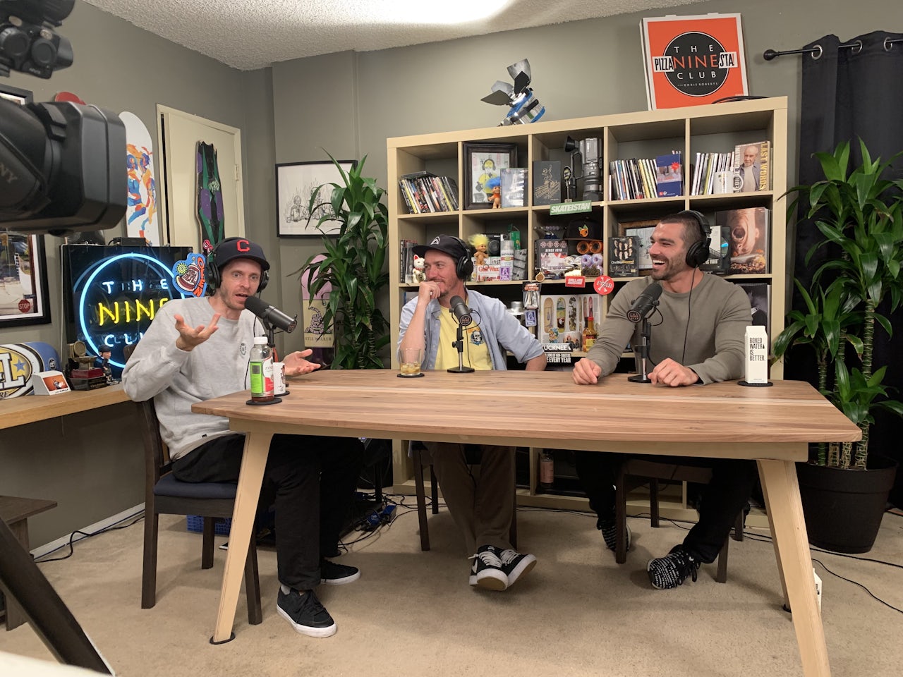 Left to Right: Chris Roberts and Roger Bagley of The Nine Club sit with guest Nick Dompierre.