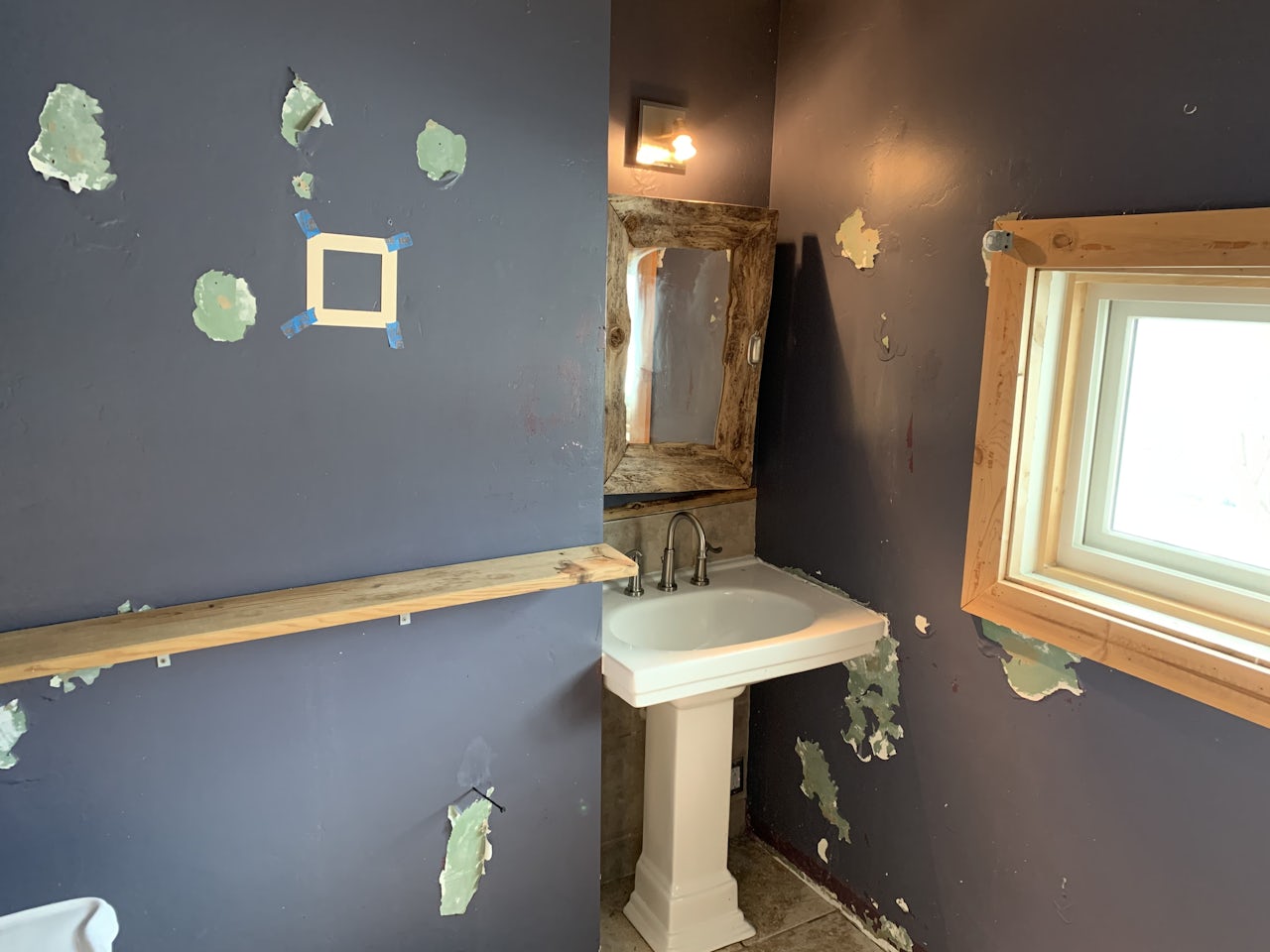 The house’s bathroom, mid-clean.